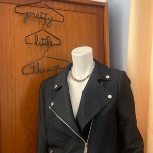 Calvin Klein motorcycle style jacket. Polyester, rayon, spandex blend.